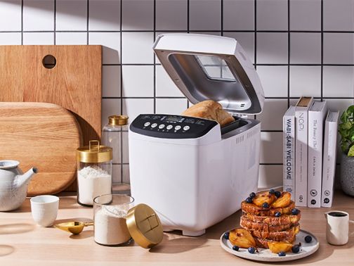 Bread maker showing baked bread inside