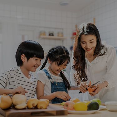 A young family preparing a meal